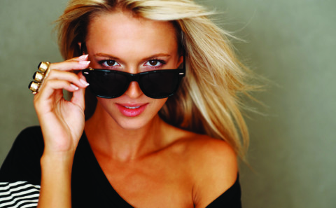 photodune-219914-cute-young-female-looking-through-sunglasses-s